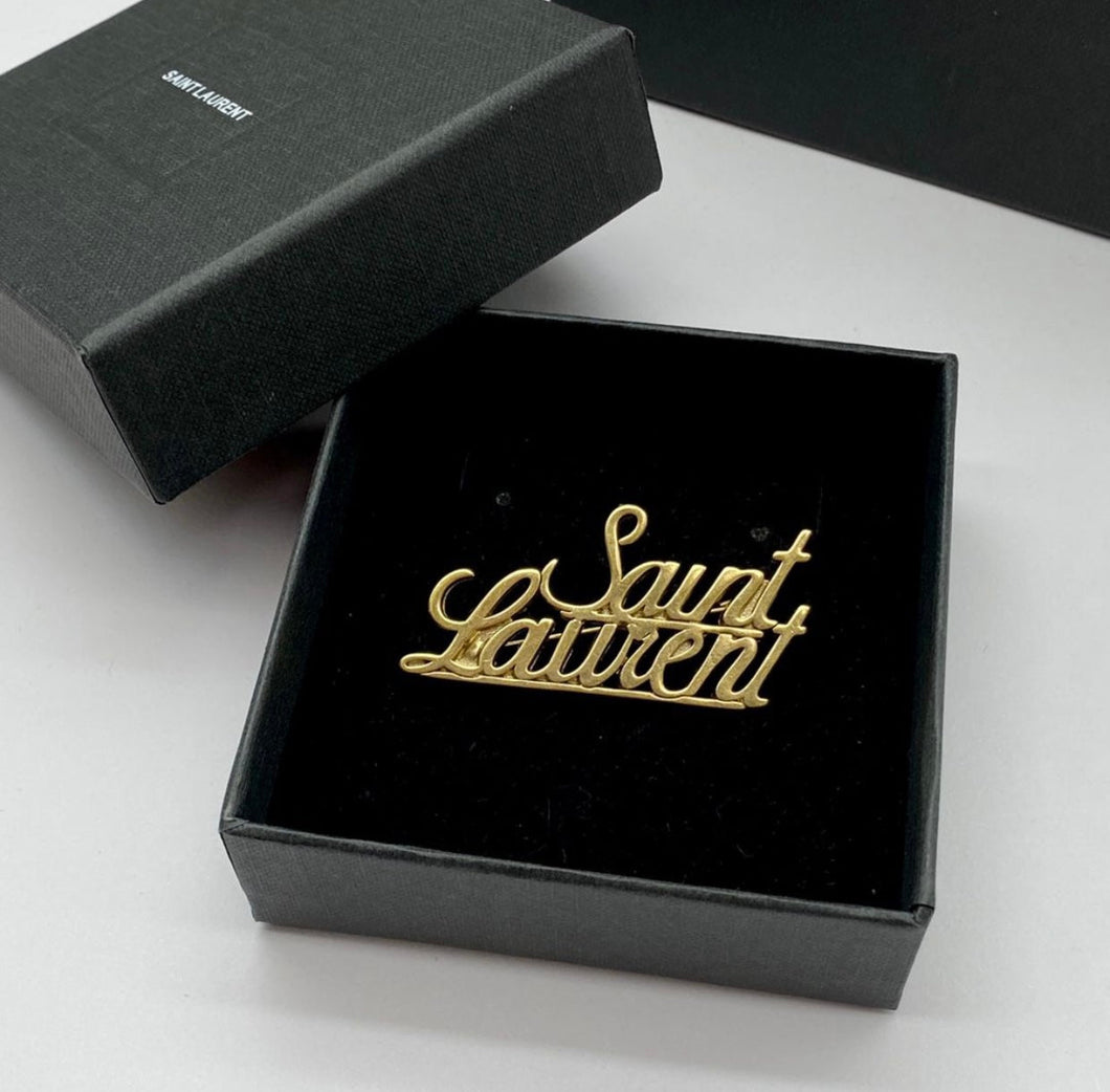 Yves Saint Laurent brooch